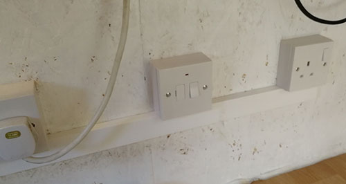 Surface mounted sockets connected using plastic trunking