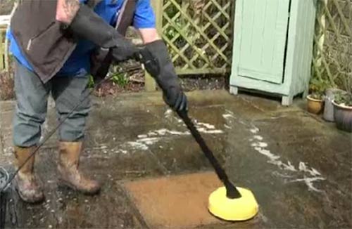 Patio cleaning attachment fitted to power washer