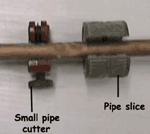 Cutting a copper pipe using a small pipe cutter and pipe slice