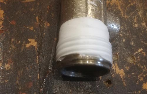 PTFE tape wrapped around radiator valve