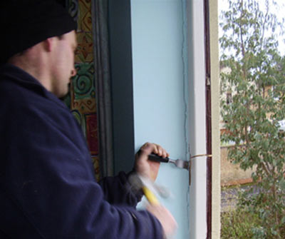 Remove window sides or jambs with a hammer and chisel