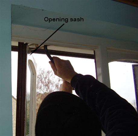 Removing awkward window sash with a wrecking bar