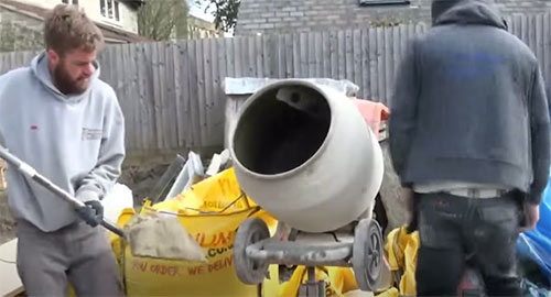 Mixing first render mix using a cement mixer