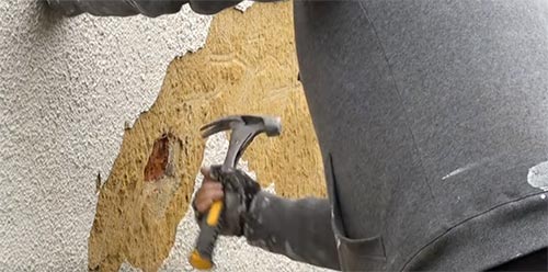 Removing old render with claw hammer