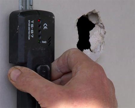 Use a wire detector to check for wires in wall