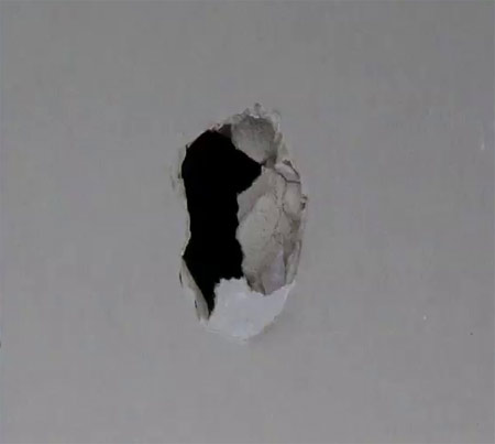 Hole in plasterboard wall