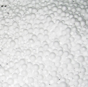 Pumped cavity insulation beads