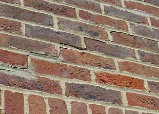 Wall badly damaged by corroded wall ties