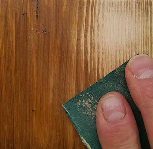 Sanding stained timber to remove colour