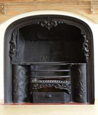 A restored cast iron fireplace