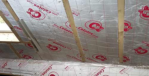 Roof insulated using hard insulation
