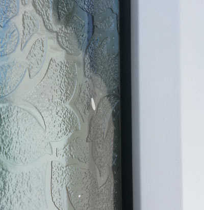 Paint splash on PVCu door glazing