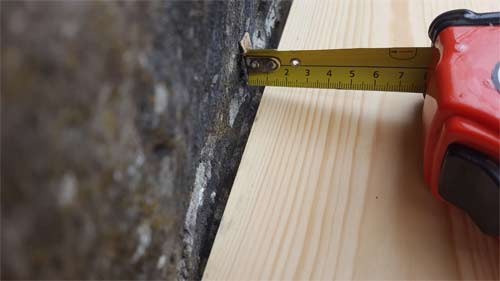 Measure any dips to ensure you remove enough material