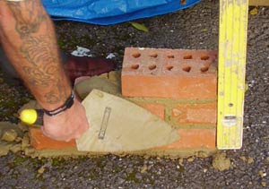 Laying bricks can take some practice