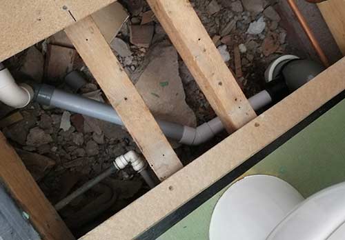 Shower waste connected in to soil pipe