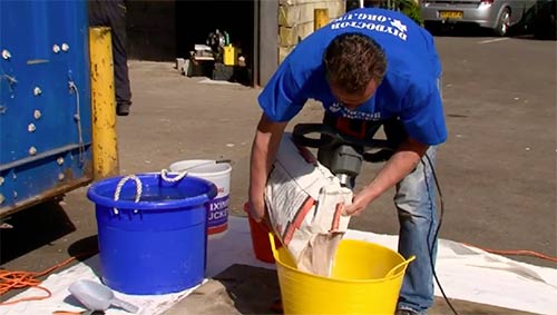 Adding plaster powder to clean, fresh water