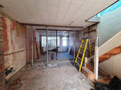 Bare walls being prepared for plastering