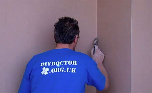 Use a damp paint brush to help define internal corners