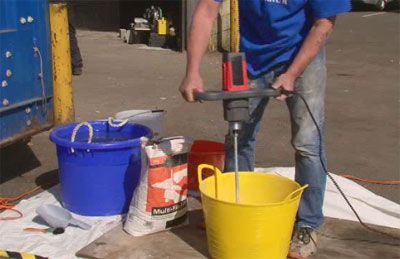 Mixing up a batch of top coat skim plaster