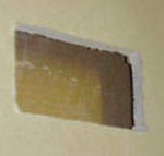 Hole cut in plasterboard for socket box