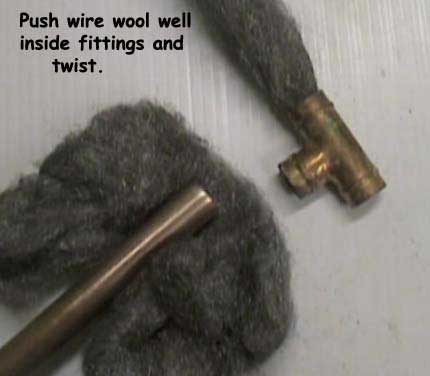 Cleaning all fittings well using wire wool