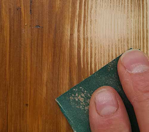 Sanding existing stained timber