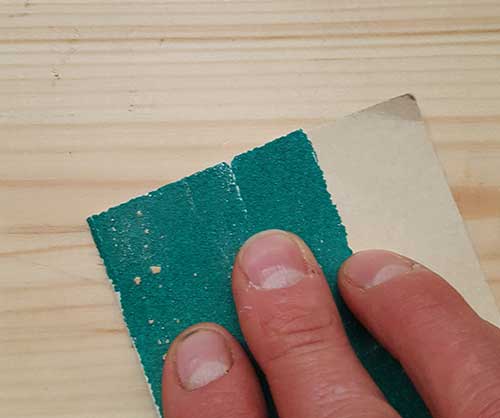 Sanding over timber surface