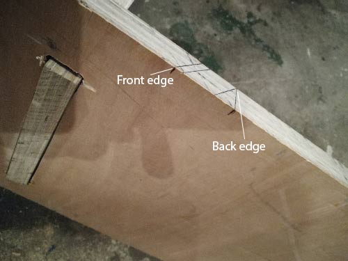 Marking out mortise cut for shelves to ensure they sit straight and level