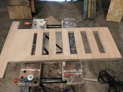 All shelf mortise joints fully cut out along main body of standing desk