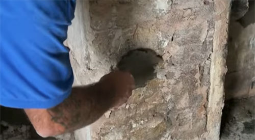 Fill all holes and depressions in walls surface