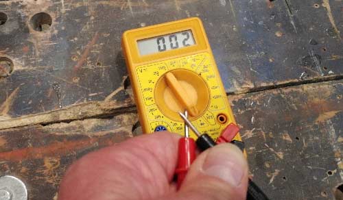 Testing multimeter working by touching probes together