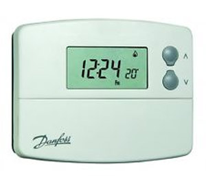 Programmable hard wired room thermostat