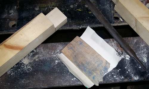 Hand file and sandpaper for cleaning up halved joints