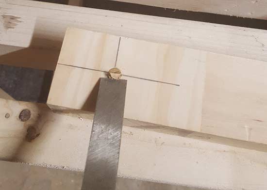 Chisel positioned ready to cut plug