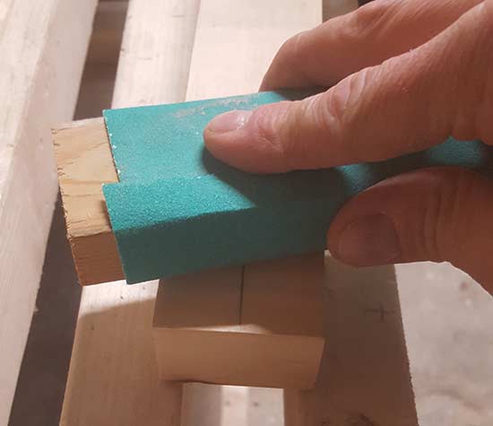 Sanding down wood plug