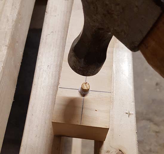 Tapping in timber plug