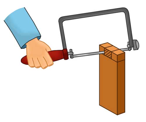 Cutting base of waste timber with coping saw