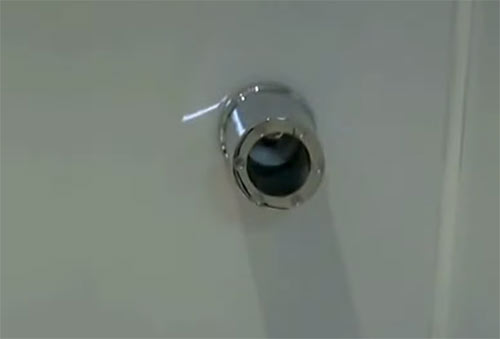 Towel radiator bracket fixed in place on wall