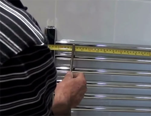 Mark top fixings on the wall