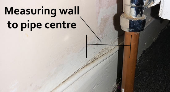 Measuring wall to pipe centre dimension