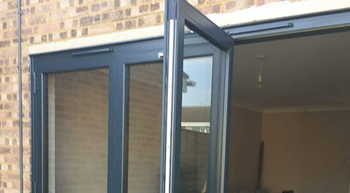 Trickle vents built into frame of bi-fold doors