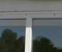 Holes in windows for trickle, or continuous vents