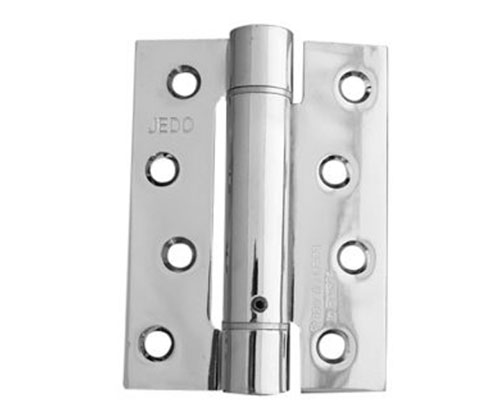 Spring loaded hinge for fire doors