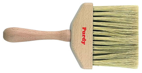 Painters and decorators dusting brush