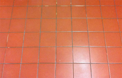 Floor tiled with red quarry tiles