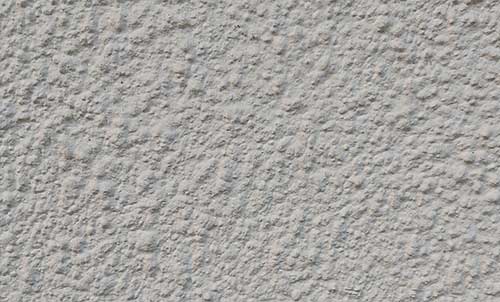 Smooth Tyrolean exterior finish on property