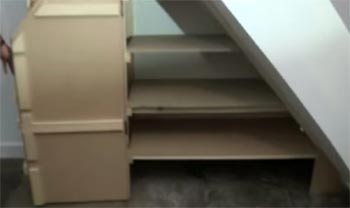 Under stairs cupboard with double hinged doors