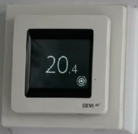 An electric underfloor heating thermostatic control unit