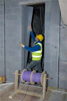 Fixing membrane to interior surface walls