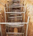 Shoring up a trench for working in